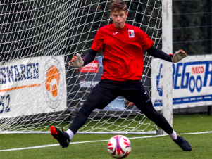 Opwarming van een keeper voor de wedstrijd